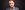 Jack Dee Comedian Jack Dee looks into the camera with a grumpy look on his face.