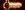 Romesh Ranganathan Romesh Ranganathan stands with his head bowed and his and his hands clasped together at his chest. There is a firey aura around him.