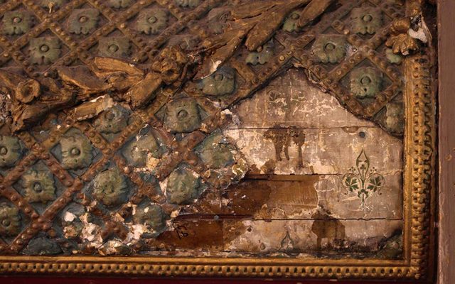 Plasterwork 2 Close up image of broken decorative plasterwork in a pattern of squares and flowers