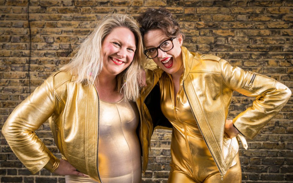 Scummy Mummies comedy duo who are Ellie Gibson (brunette) and Helen Thorn (blonde)