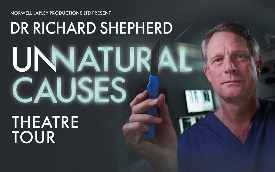 Dr Richard Shepherd Dr Richard Shepherd poster, wearing blue scrubs and holding a scalpel