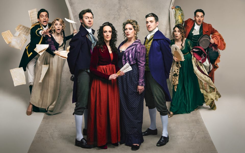 Austentatious cast wearing regency clothing