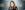 Kay Mellor Kay Mellor smiles to the camera against a Band of Gold Media board