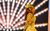 Oti Mabuse I Am Here Oti Mabuse in a gold jacket and top hat