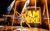 Oti Mabuse I Am Here Oti Mabuse shimmying in a gold outfit in front of the words I AM HERE in yellow lights