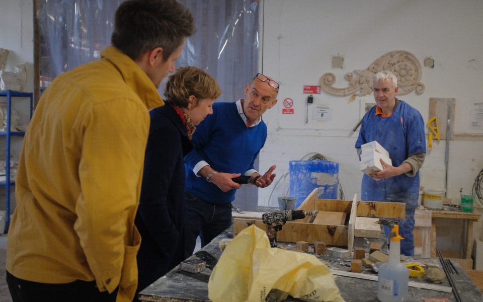 Darwen Terracotta Workshop employees talking through the process with HPPH staff