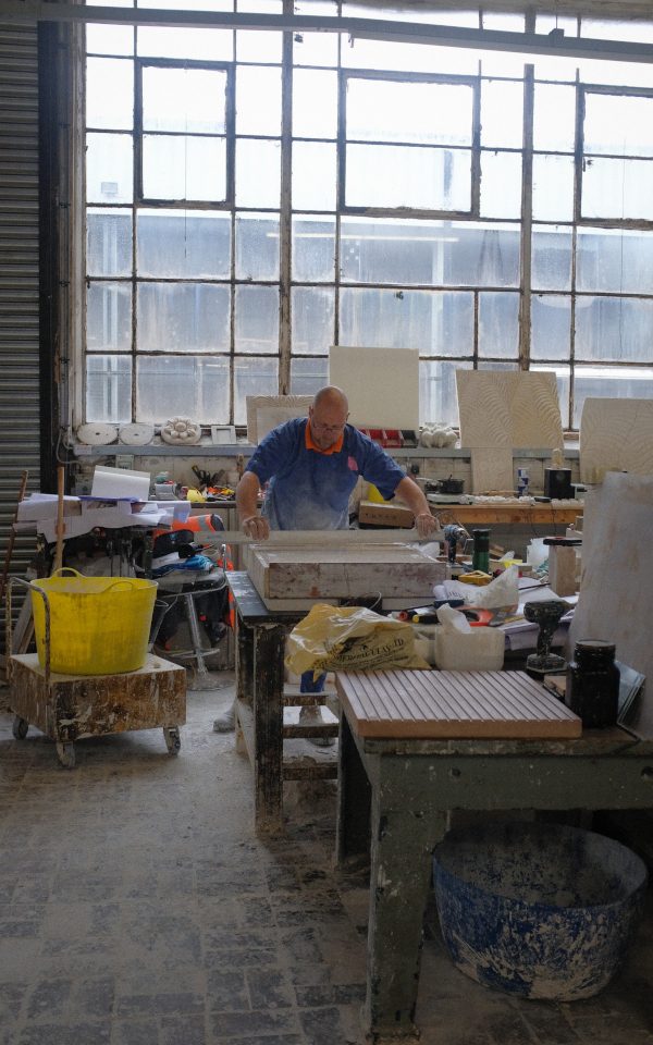 Darwen Terracotta worker making a tile