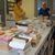 Darwen Terracotta Studio Various tiles of different sizes and colours on a table at the workshop