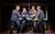 Jersey Boys Production Photo Four men in suits singing around a mic