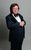 Jon Culshaw - Press - Credit Steve Ullathorne Jon Culshaw as Les Dawson in a suit and a big bow tie