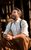 Julian Ovenden (as Emile de Becque) in Chichester Festival Theatre’s SOUTH PACIFIC Photo Johan Persson_59450 Julian Ovenden as Emile de Becque in a white shirt and braces sat down singing