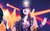 RockyHorror A woman in a sparkly jacket and top hat