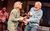 Susan Penhaligon, Robert Duncan A man and a woman face each other and laugh