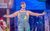 James William-Pattison in Rock 'n' Roll Panto A man in overalls with his arms outstretched.