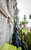 Elphaba outside Leeds Town Hall. Credit Ant Robling An actress dressed as Elphaba in a black dress and witch's hat outside Leeds Town Hall