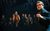 LES MISERABLES UK TOUR. Will Callan 'Marius'. Photo Danny Kaan A close up on Marius as the ghosts of his friends stand behind him.