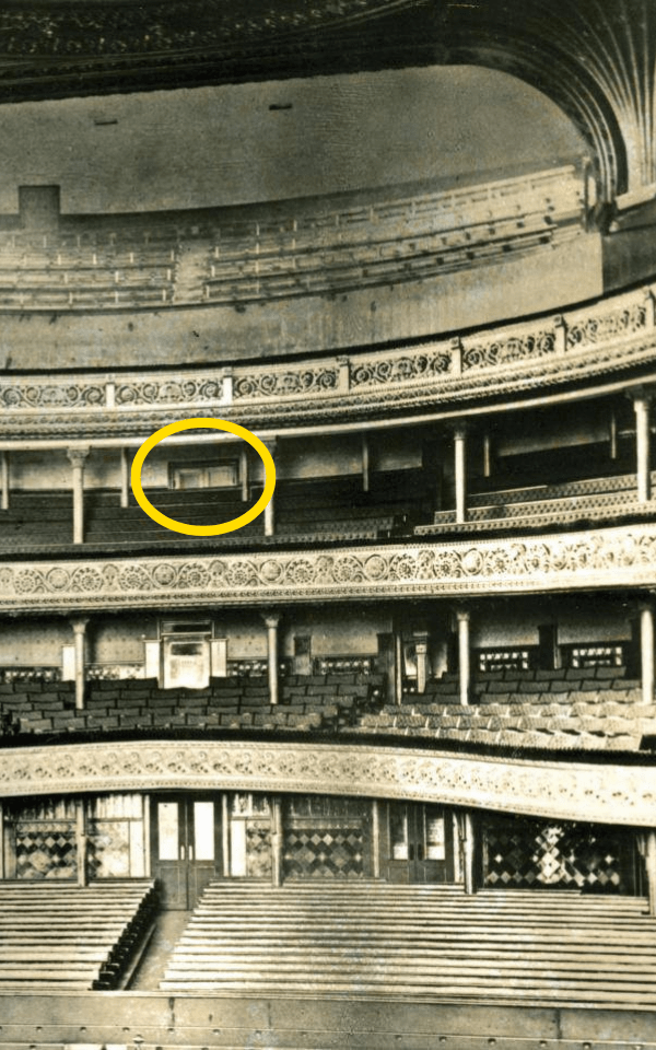 Leeds Grand auditorium pictured c.1930 - a circle is highlighting a door in the middle of the Upper Circle level where the Waiter ghost has reportedly been spotted