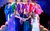 Greatest Days The cast of Greatest Days. They are wearing brightly coloured outfits.