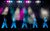 Greatest Days Regan Gascoigne, Kalifa Burton, Archie Durrant, Jamie Corner & Alexanda O'Reilly in Greatest Days. The men, wearing all-white outfits, are singing on stage and dancing in unison.