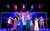 Greatest Days The cast of Greatest Days. They are wearing brightly coloured outfits.