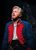 Dean Chisnall as Jean Valjean Dean Chisnall in a blue and red military jacket singing