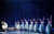 The snow scene Ballerinas in a row in white tutus with snow falling around them