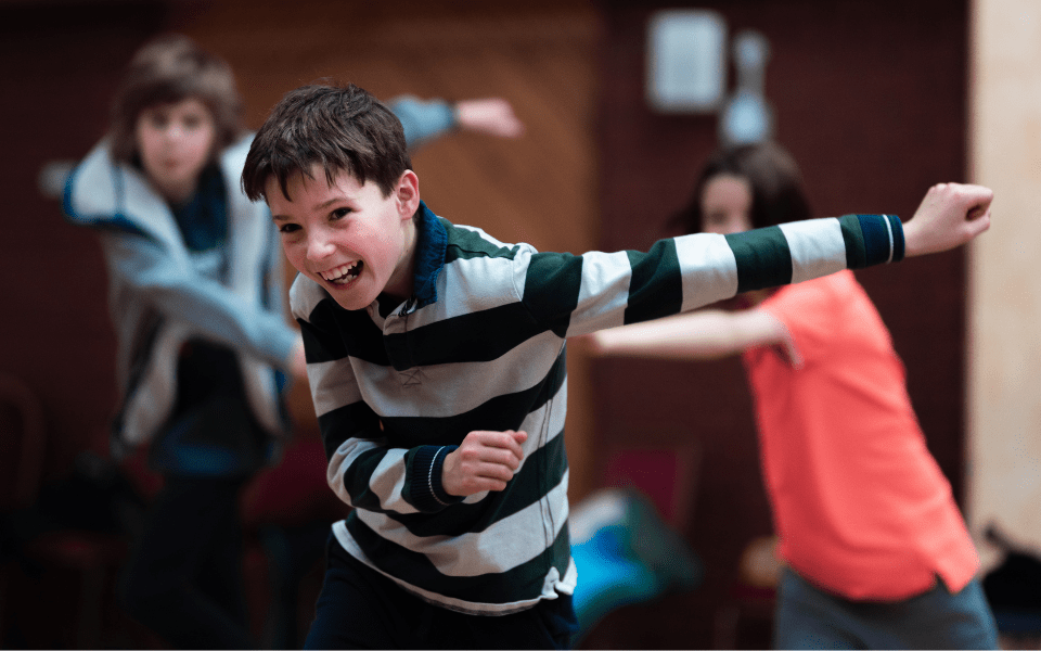 The Grand Academy Workshop students dancing