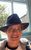 Jaki Taylor Jaki Taylor in front of a window with a fedora hat on.