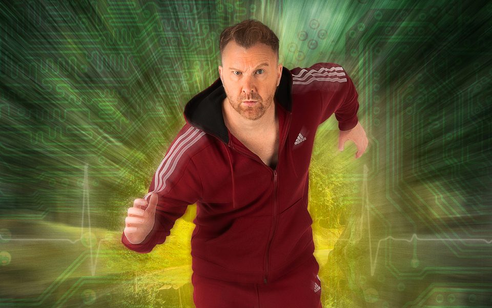 Jason Bryne is in a track suit running towards the screen. The background looks like a computer interface with a heart rate line intersecting the centre.