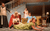 Pride and Prejudice* (*sort of) (4) A woman in a green dress being dragged screaming across a floor by a woman in a red dress. Three women in the living room look on in shock.