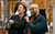 Jennifer France as Zerbinetta and Daniel Norman as Dancing Master in rehearsal for Ariadne auf Naxos A woman looks up and next to her a man in glasses holds his finger up to her