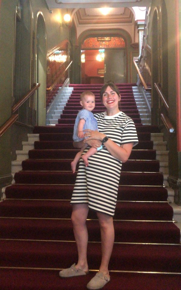 Anna and her baby Scarlett on the stairs at The Grand.