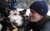 Gordon Buchanan Gordon Buchanan in a black winter hat with his face next to a dog