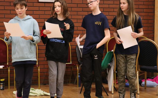 Group 2 with scripts 4 LGYT members are holding and reading scripts