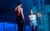 Dirty Dancing Baby walks towards a shirtless Johnny.