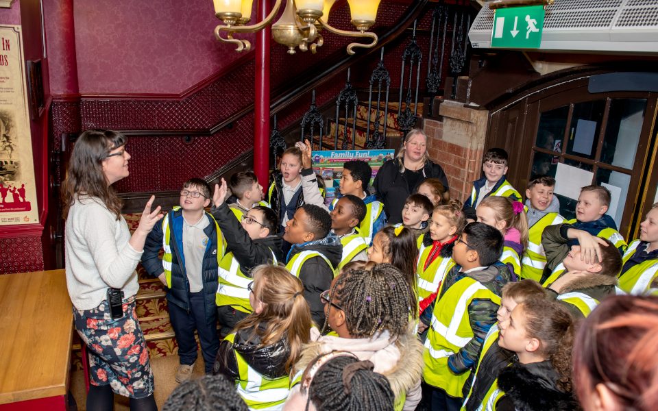 A group of students are briefed in the foyer of City Varieties. Credit: Ant Robling