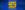 Come From Away The title 'Come From Away' is written in yellow against a blue backdrop. The 'O' in 'From' is a graphic of the earth. White text above reads 'Direct from the West End.'