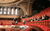 KS4 - Work Experience A group of secondary schoolchildren sit in the Leeds Grand Theatre auditorium at a distance during a theatre tour