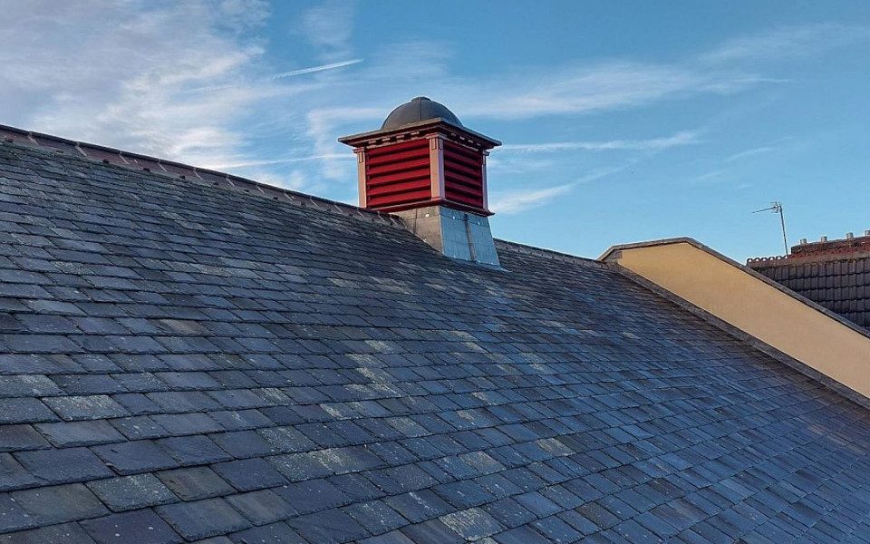 A refurbished roof vent coloured red at Hyde Park Picture House.