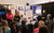Work experience presentations Three year 10 pupils giving a presentation in front of an audience.