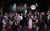 The Addams Family - Uncle Fester and Ancestors Uncle fester is singing up to the moon in the sky on stage. The ancestors are are surrounding covered in foliage.