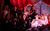 Addams Family 2023 A close-up of a group of performers holding their hands to their chests and singing