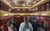 CVMH Tour Young people on stage at City Varieties Music Hall, looking out into an empty auditorium. Credit: Kate Southam