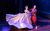 The King and I Annalene Beechey in a lilac ballgown and Darren Lee in a traditional Thai costume dancing together.