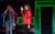 Everybody's Talking About Jamie Ray is wearing a red jacket and posing.