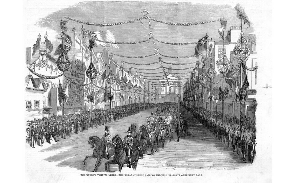 An illustration of the royal procession passing through Briggate, labelled 'The Queen's visit to Leeds - The royal consort passing through passing through Briggate'.
