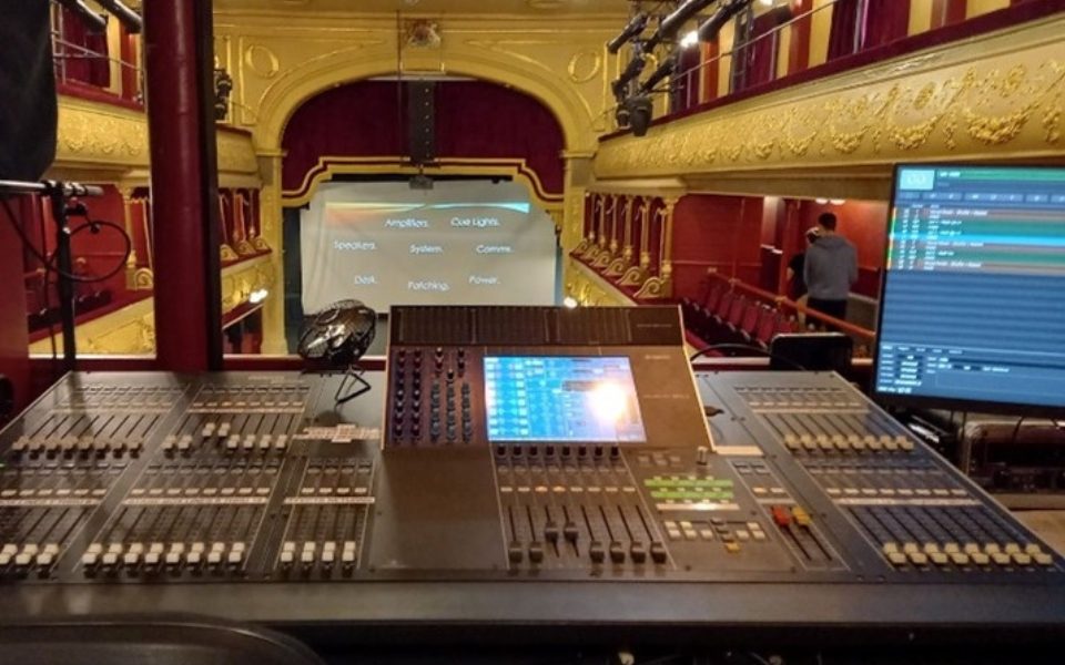 The sound desk at City Varieties. In the background is the auditorium and stage.