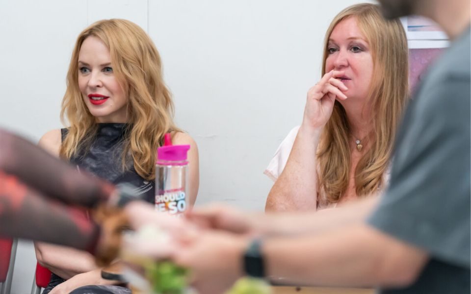 Debbie Isitt and Kylie Minogue in rehearsal for I Should Be So Lucky