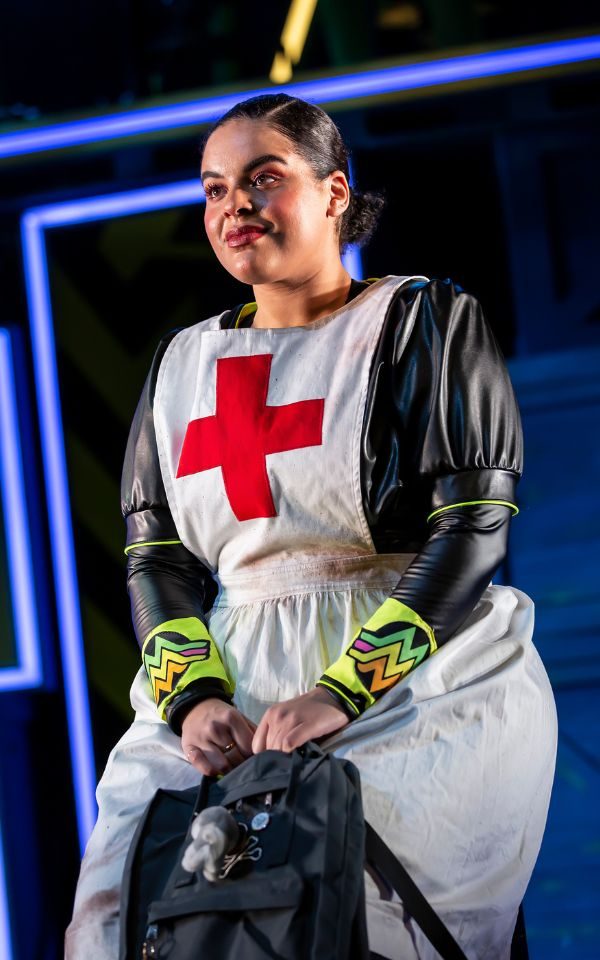 The character of Mary Seacole dressed in British Red Cross uniform on stage during a previous run of Fantastically Great Women Who Changed the World.