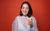 Luisa Omielan Luisa Omielan smiling at the camera and holding up a lemon.
